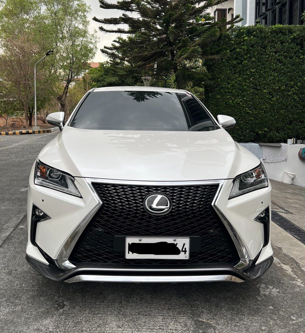 Lexus RX350 Executive (A) (Category: Used Cars) located in Taguig. Submitted by scalpeljm (Listing ID 1292356270, Image 2). Description: Local purchased. 22 inch Versus mags and tires, 60+ t kms, brown leather interior , new tires and break pads , like new, casa serviced.