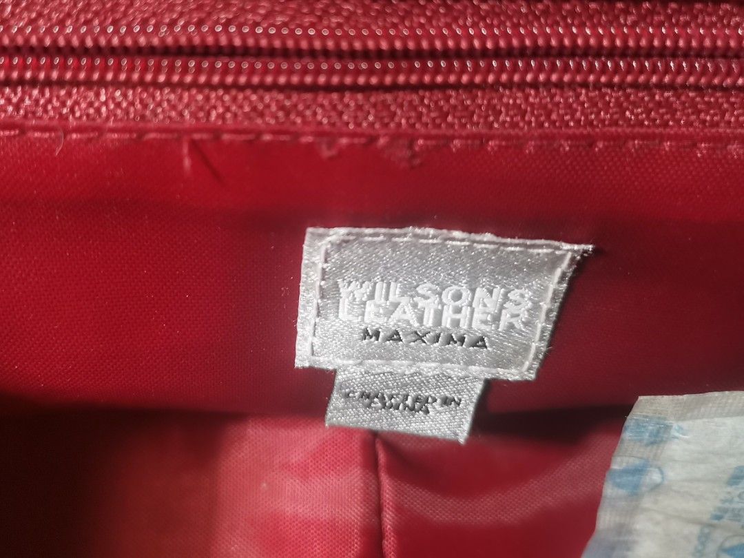 MAXIMA - WILSON'S LEATHER CHAINED AUTHENTIC LEATHER BAG (Category: Luxury Bags & Wallets) located in Pasig City. Submitted by healthnfeshn (Listing ID 1291140623, Image 3). Description: Maroon colored. Very nice in person. Good for party. Tiny bag..