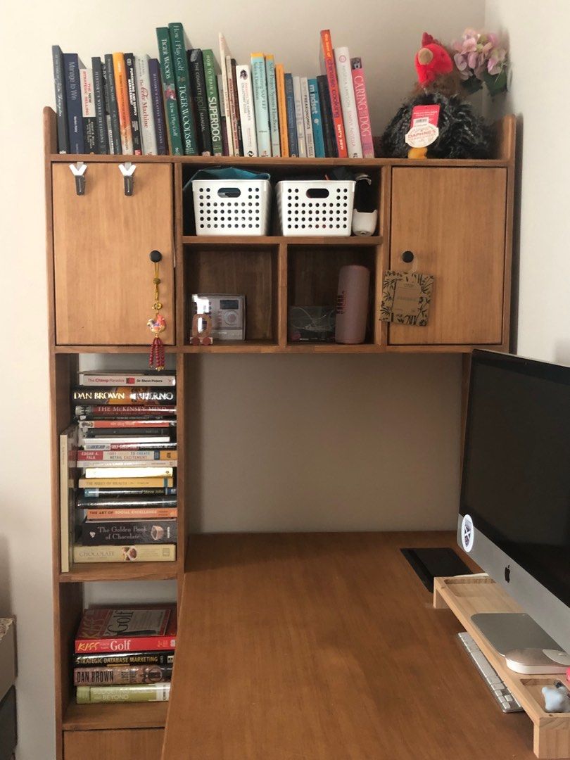 Study desk / table (Category: Tables & Sets) located in Singapore. Submitted by dadaa16 (Listing ID 1292334185, Image 2). Description: To further clarify, entire depth is 1m, while the inner depth is 70cm, which makes the outer depth (shelf) 30cm. The length runs 1.8m. Highly functional with the open/closed shelves, it’s also fitted with two baskets attached under the table, there is no need to worry for messy cords or wires which allows easy cle