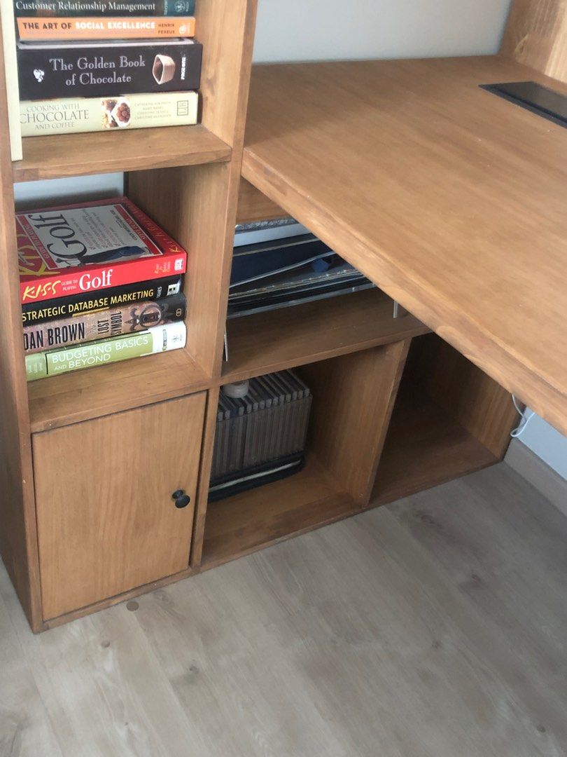 Study desk / table (Category: Tables & Sets) located in Singapore. Submitted by dadaa16 (Listing ID 1292334185, Image 3). Description: To further clarify, entire depth is 1m, while the inner depth is 70cm, which makes the outer depth (shelf) 30cm. The length runs 1.8m. Highly functional with the open/closed shelves, it’s also fitted with two baskets attached under the table, there is no need to worry for messy cords or wires which allows easy cle