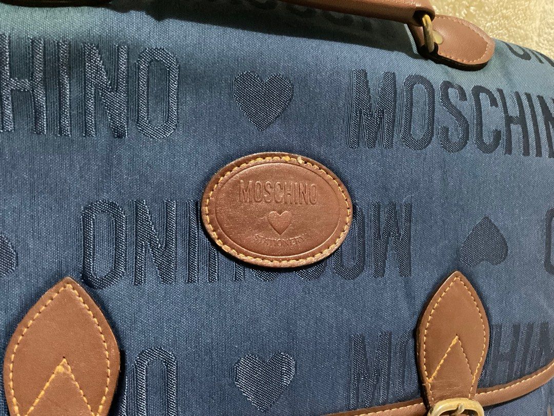 Vintage Moschino briefcase/messenger bag (Category: Luxury Bags & Wallets) located in Caloocan City. Submitted by siftedthriftedph (Listing ID 1292367377, Image 2). Description: Authentic; hard to find Moschino Can fit 13-13.5in laptop Signs of use sa hardwares, polish niyo na lang Maganda pa ang leather Vintage smell Plus sf.