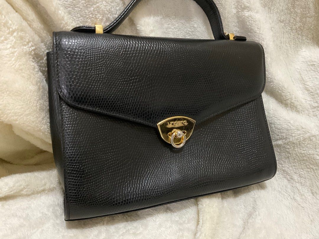 Vintage Ungaro bag (Category: Luxury Bags & Wallets) located in Caloocan City. Submitted by siftedthriftedph (Listing ID 1292380430, Image 2). Description: Authentic; Vintage Ungaro top handle bag L-9.8in x H-7.2in Very nice Will provide sling.
