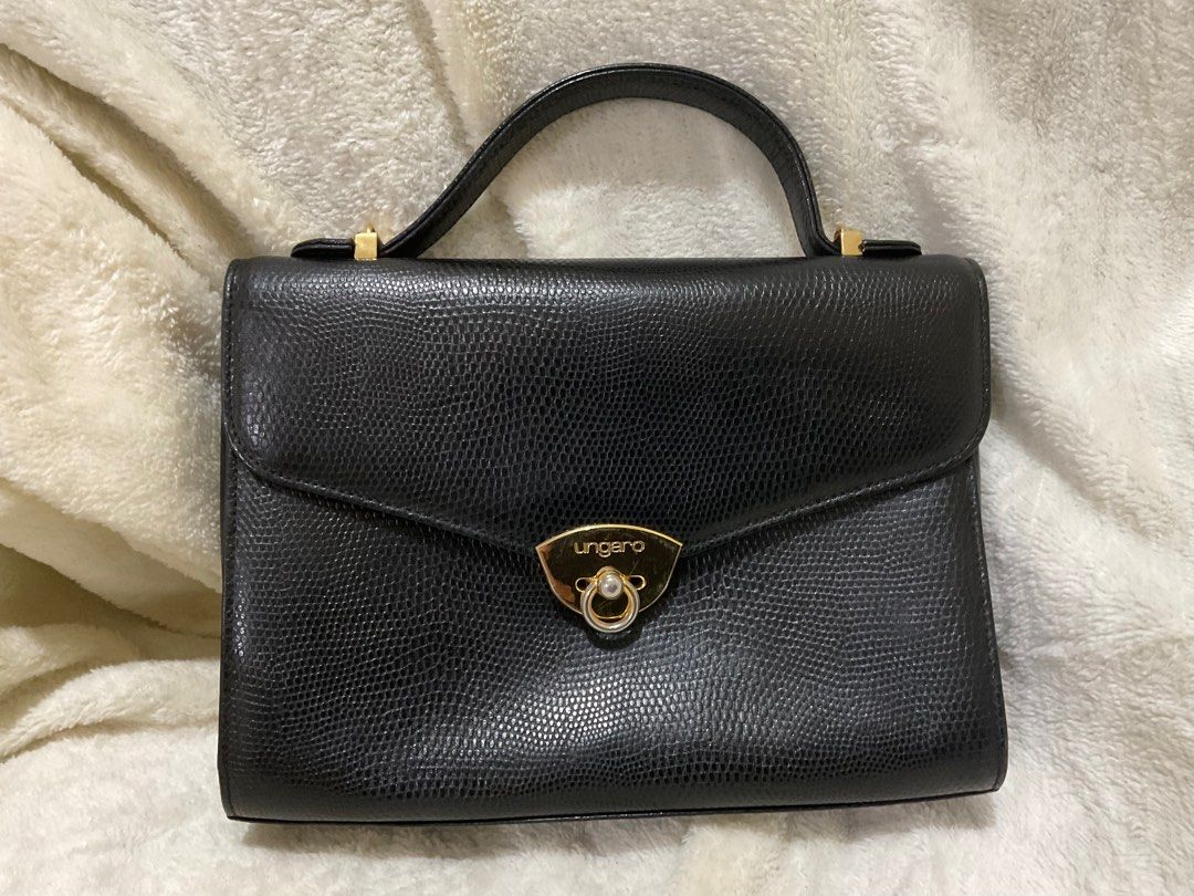 Vintage Ungaro bag (Category: Luxury Bags & Wallets) located in Caloocan City. Submitted by siftedthriftedph (Listing ID 1292380430, Image 1). Description: Authentic; Vintage Ungaro top handle bag L-9.8in x H-7.2in Very nice Will provide sling.