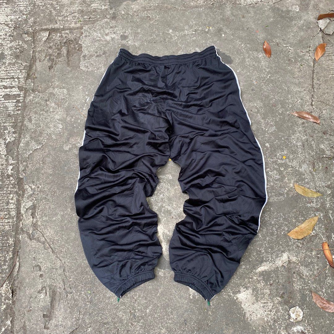 Y2k Nike track pants, Men's Fashion, Bottoms, Joggers on Carousell