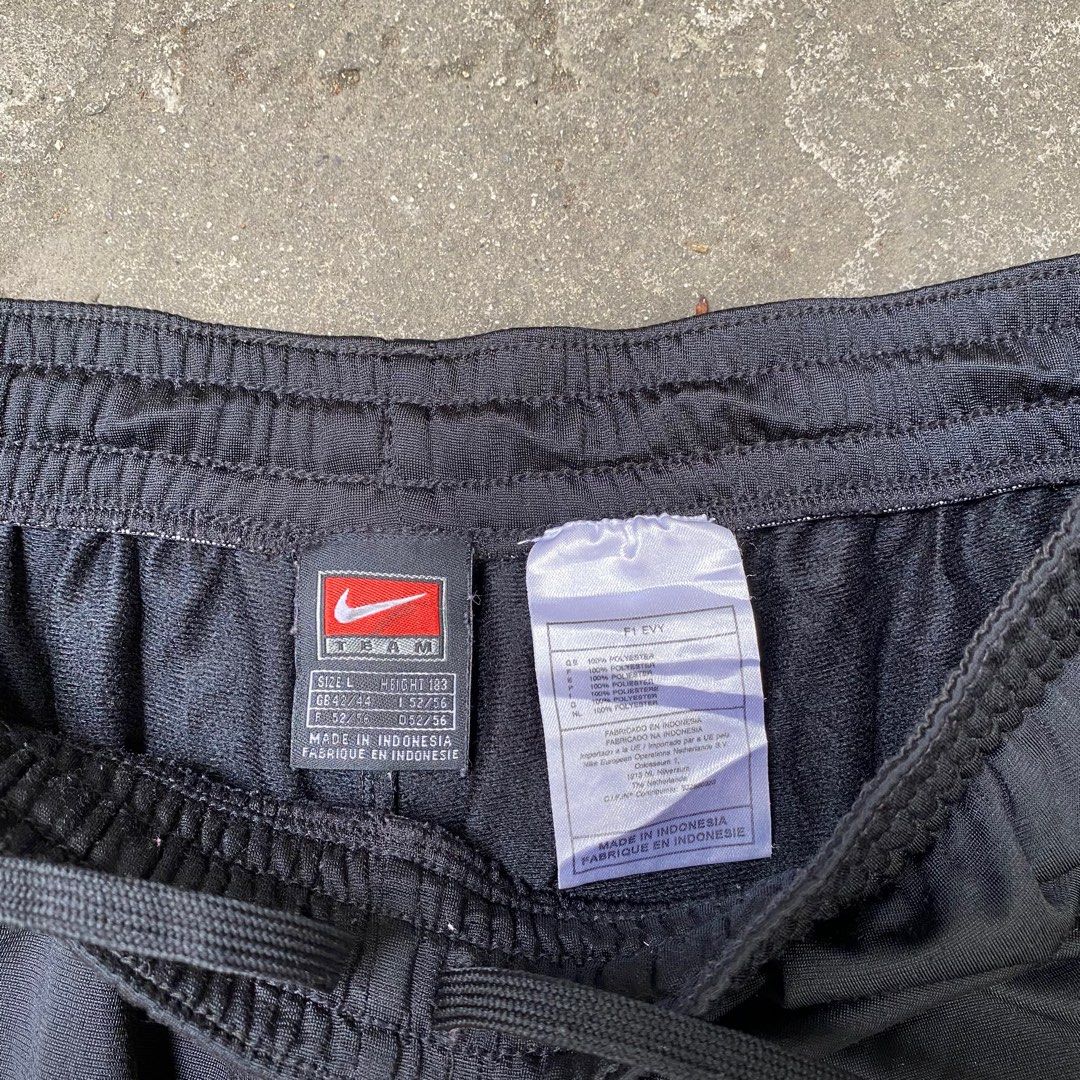 Y2k Nike track pants, Men's Fashion, Bottoms, Joggers on Carousell