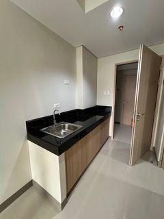 28sqm 2 bedroom condo -newly turnovered and semi furnished