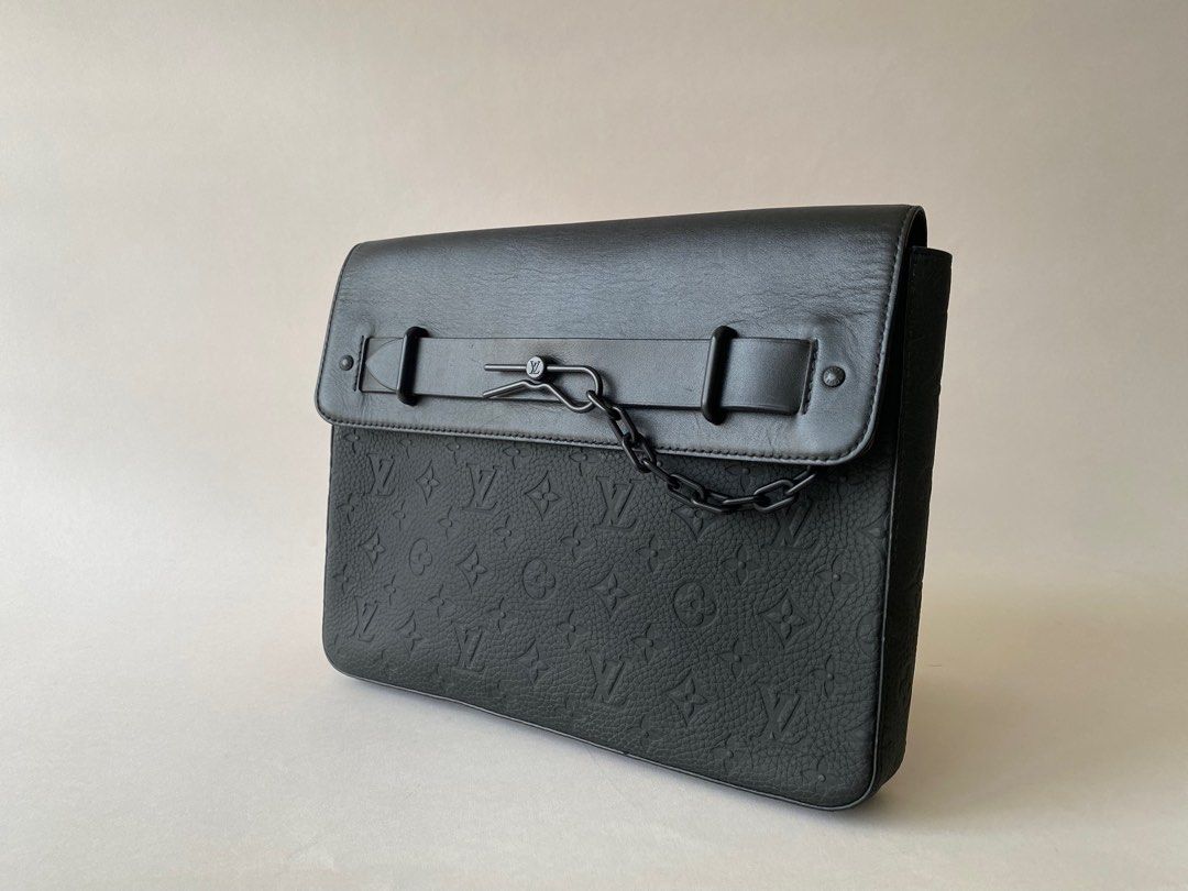 96% NEW LV POCHETTE STEAMER TAURILLON (Category: Luxury Bags & Wallets) located in Taguig. Submitted by sweetluxuryph (Listing ID 1292617150, Image 3). Description: 💯 GUARANTEED AUTHENTIC ✨55,000✨ Black Taurillon Grained Leather with Monogram Embossed Black Hardware & Chain Details Dimension-12.5”x10”x1.75” Mint Condition, Rank A-SA Comes with Card, Dustbag & Box.