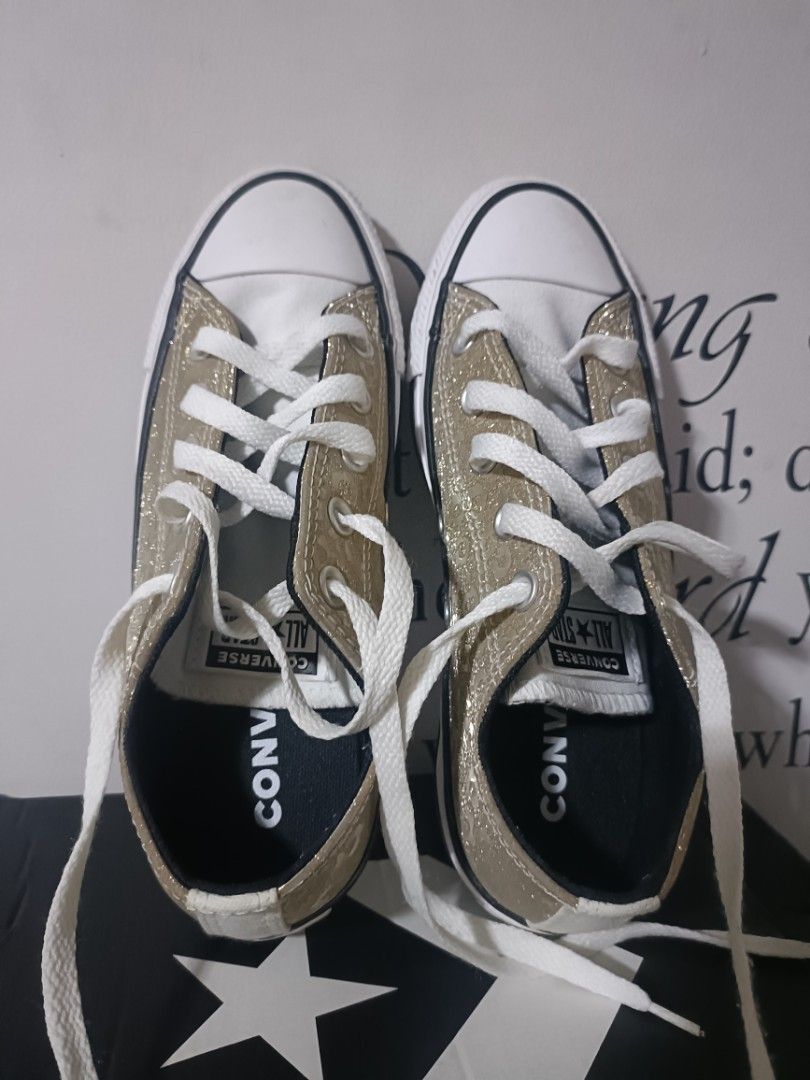 Authentic Converse glitter gold sneakers (Category: Sneakers) located in Quezon City. Submitted by MsMars (Listing ID 1292626710, Image 3). Description: Authentic converse Brand new RFS: I'm size 38, my sister bought size 37 Best Buy original price 3800.