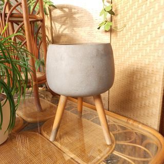Elevated cement wood plant pot