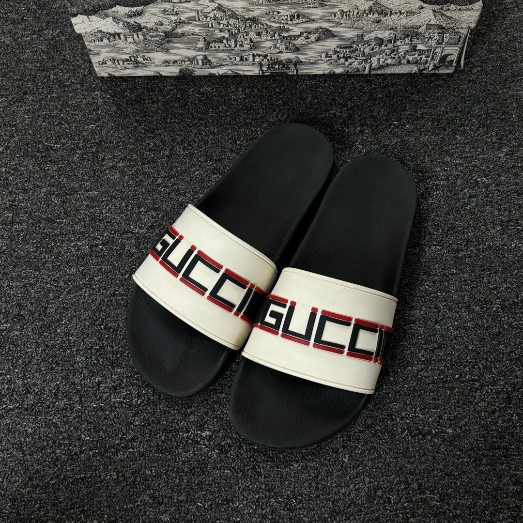 Gucci embossed slides cheap