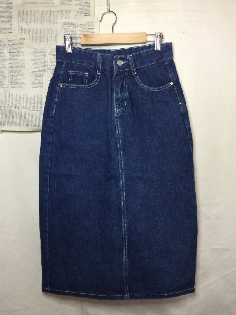 DARK BLUE DENIM LONG SKIRT (Category: Skirts) located in Quezon City. Submitted by lovedbyzi_ (Listing ID 1292517354, Image 1). Description: size 24 to 25 – like new – dark blue denim color.