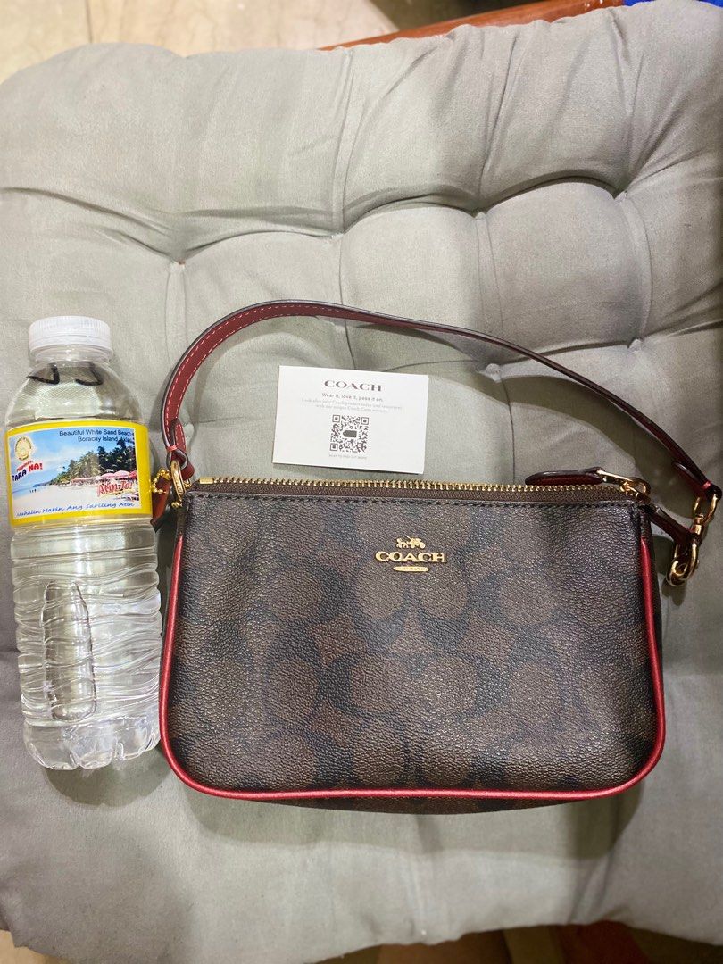 Mini coach bag 7.25x4.5 inches (Category: Luxury Bags & Wallets) located in Quezon City. Submitted by oondin (Listing ID 1292537015, Image 3). Description: New. Never used and stored. No dustbag. Bought in the US. Impulse buy. Bag too small for my lifestyle 😅.