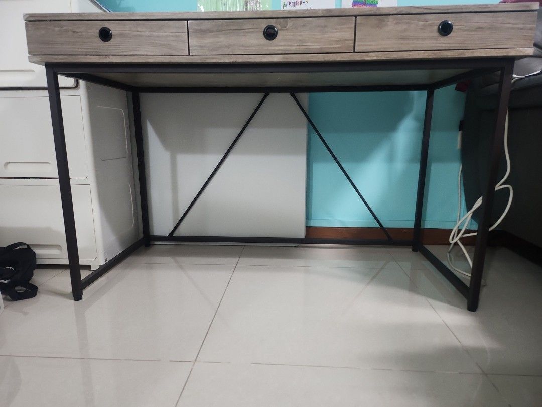 Working Table (Category: Tables & Sets) located in Singapore. Submitted by xcesskiosk (Listing ID 1292582437, Image 1). Description: Study/working table Bought from FortyTwo. minor scratch on the corner of the tables. Self-collect. 120cm (L) x 60cm (D) x 76.5cm (H).