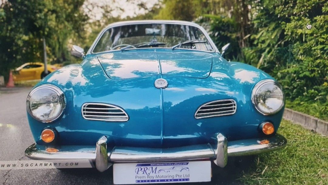 Volkswagen Karman Ghia 1.6MT karman Ghia Manual (Category: Used Cars) located in Singapore. Submitted by wtay1 (Listing ID 1292548130, Image 2). Description: A 1966 Volkswagen/ Karman Ghia comes with a 1966 number plate. Full done up with top-notch audio systems. Aircon Installed. Pristine condition. This car offers a luxurious audio experience that complements the car's timeless design and enhances the driving experience for audiophiles and enth
