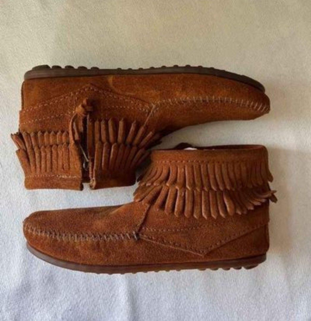 Boho Minnetonka Suede Genuine Leather Ankle Fringe Moccasin Boots Shoes (Category: Boots) located in San Juan City. Submitted by mxaoyxnoe (Listing ID 1292772992, Image 1). Description: - Authentic handmade genuine leather Minnetonka boots in Camel Brown (Double fringe) - Rare blue stamp and side zipper - Used twice for Boho-themed event - Size: 23.7cm (US6 /UK4 /EU37) - Shoes only - Check price references in Minnetonka moccasin website - Super c