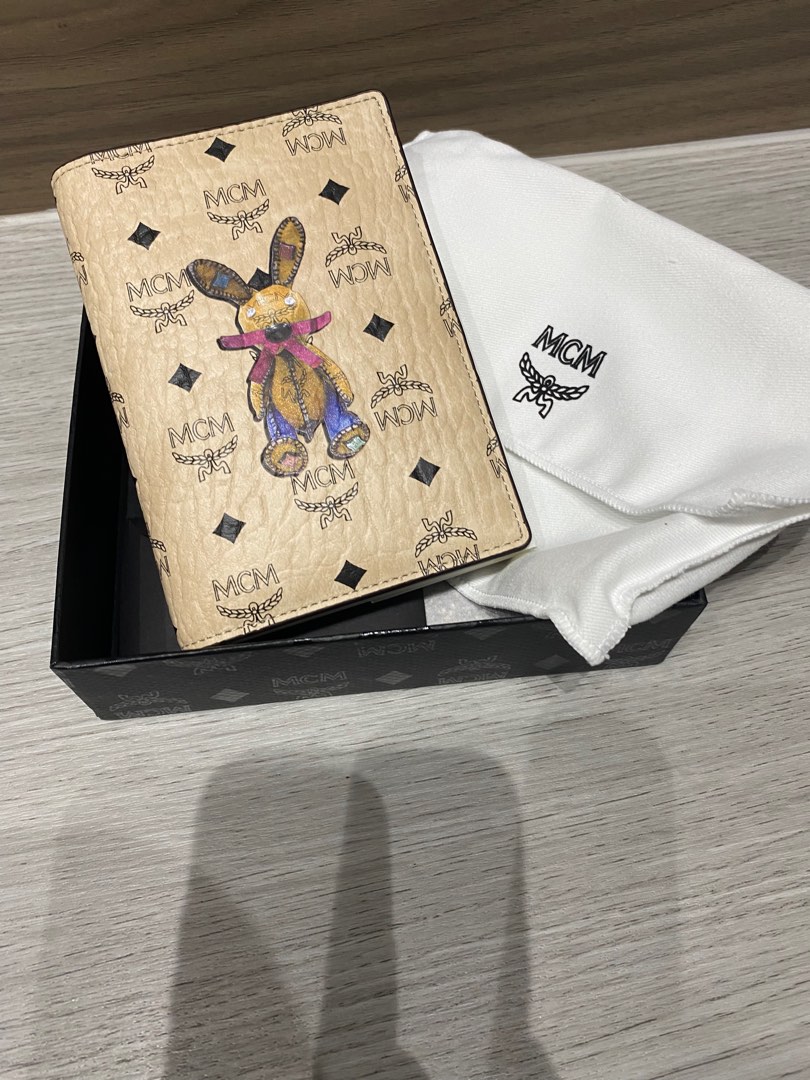 MCM passport holder Luxury Bags Wallets on Carousell