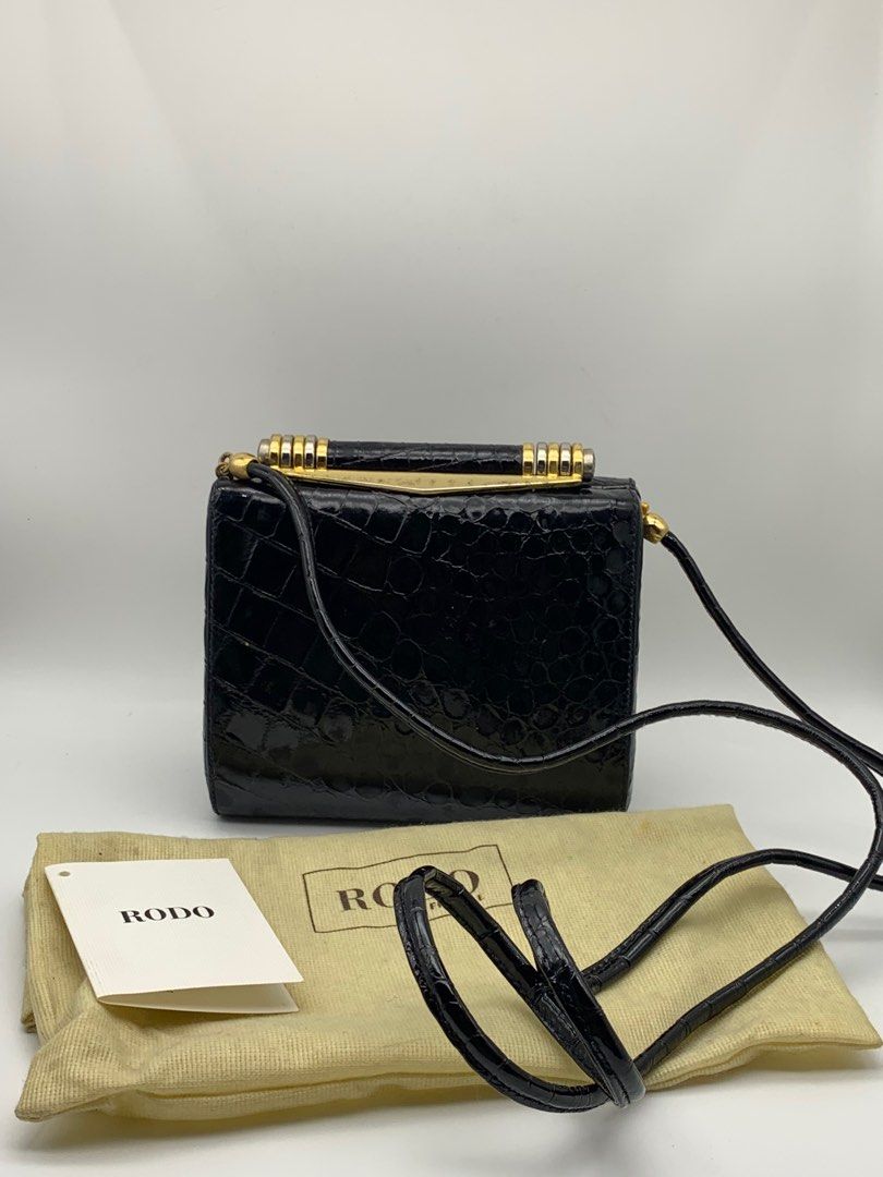 RODO vintage crocskin crossbody bag (Category: Luxury Bags & Wallets) located in Tacloban City. Submitted by houseofluxury.co (Listing ID 1292676549, Image 1). Description: Authentic With tag, dustbag and box Vintage and rare find po 💯.