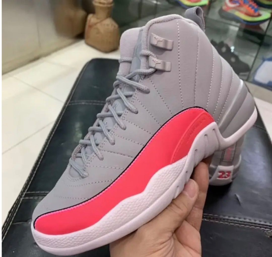Pink and grey jordan 12 deals