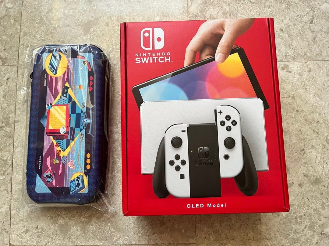 Nintendo Switch OLED (Category: Nintendo) located in Singapore. Submitted by cgenuine (Listing ID 1292914949, Image 1). Description: Brand new, not open. With Nintendo Switch OLED case .