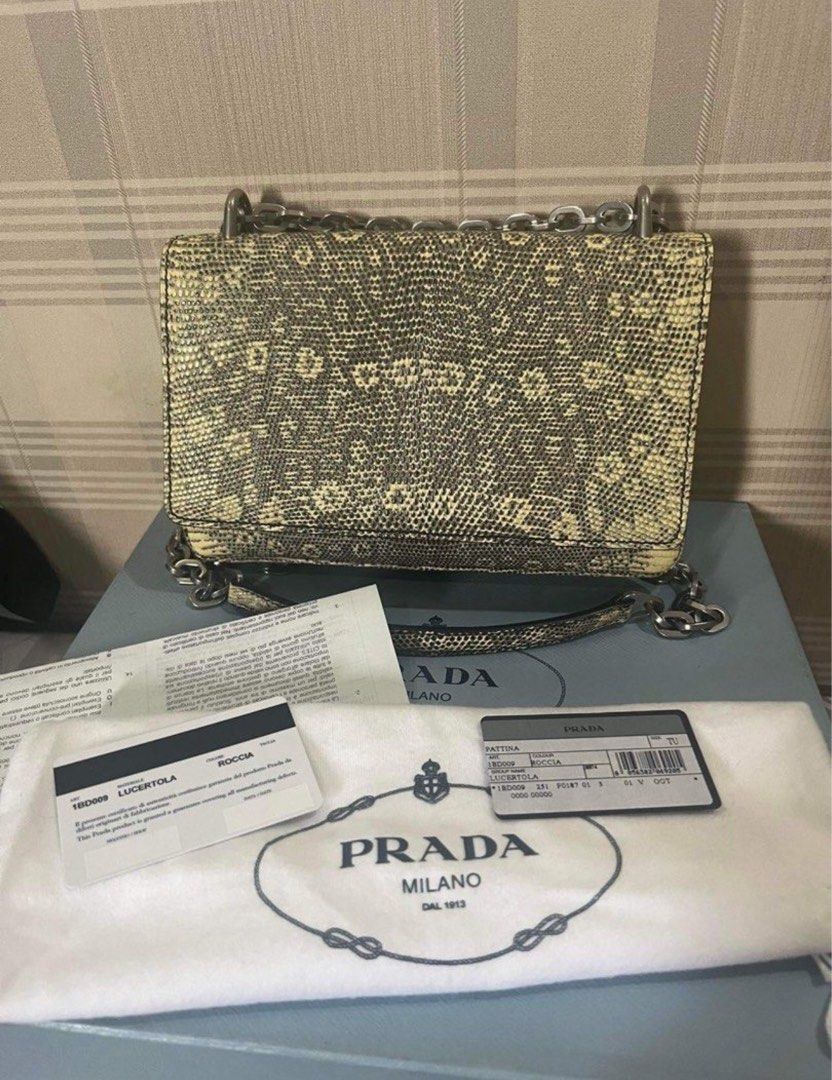 Prada sling clutch bag (Category: Luxury Bags & Wallets) located in Pasig City. Submitted by luxuryitems2021 (Listing ID 1292943124, Image 1). Description: Open for layaway.