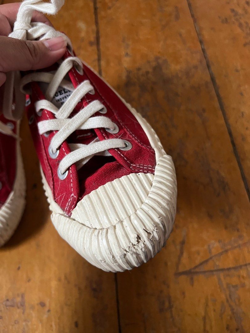 Red sneakers from Japan (Category: Sneakers) located in Rizal. Submitted by hobbyist_declutter (Listing ID 1292808811, Image 3). Description: Selling my sneakers from Japan, selling it low because of scratch in front from my dog Nice color of red.