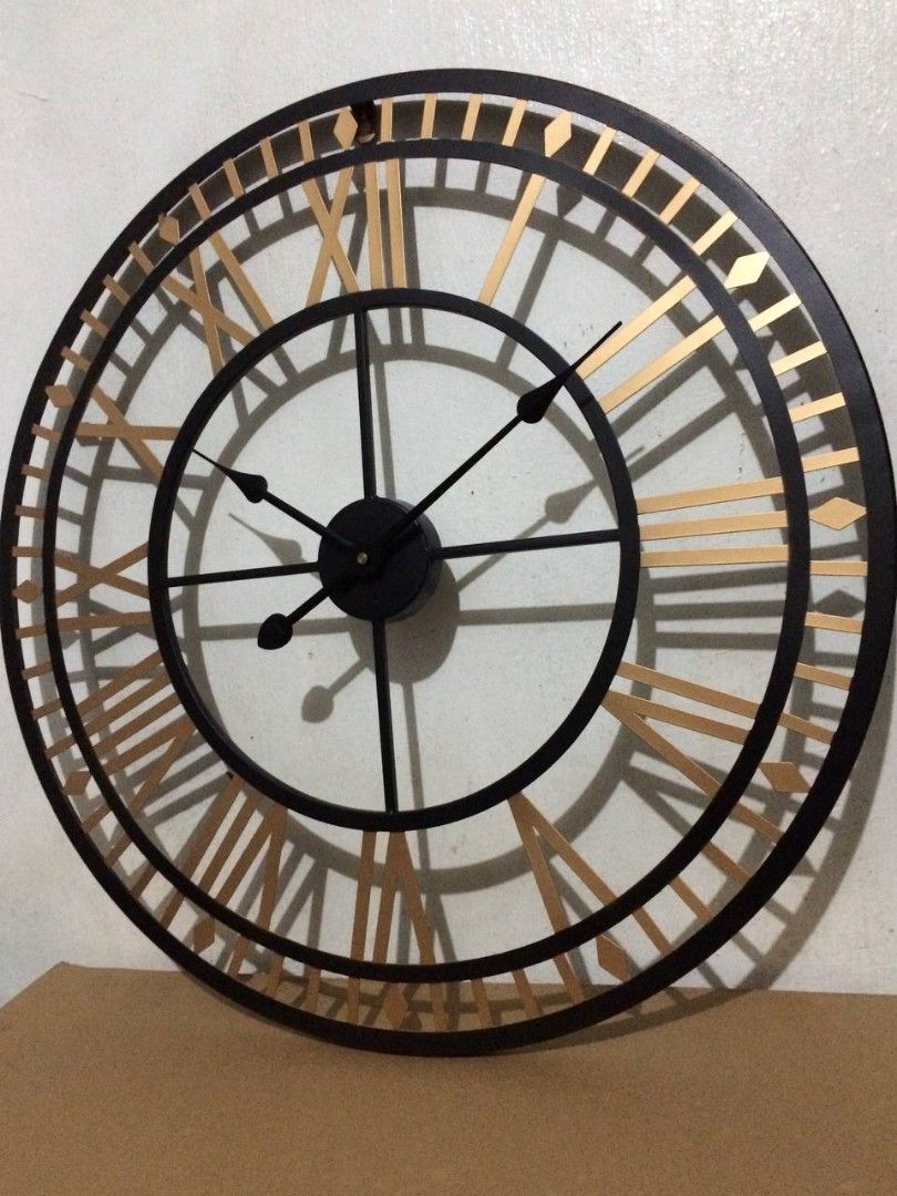 24 inch Large decorative wall clock (Category: Wall Decor) located in Caloocan City. Submitted by relique_boutique2026 (Listing ID 1293066971, Image 1). Description: Dimension: 60cm/ 24 inch diameter Material: Metal Location: Caloocan South can ship within the day thru Lalamove.