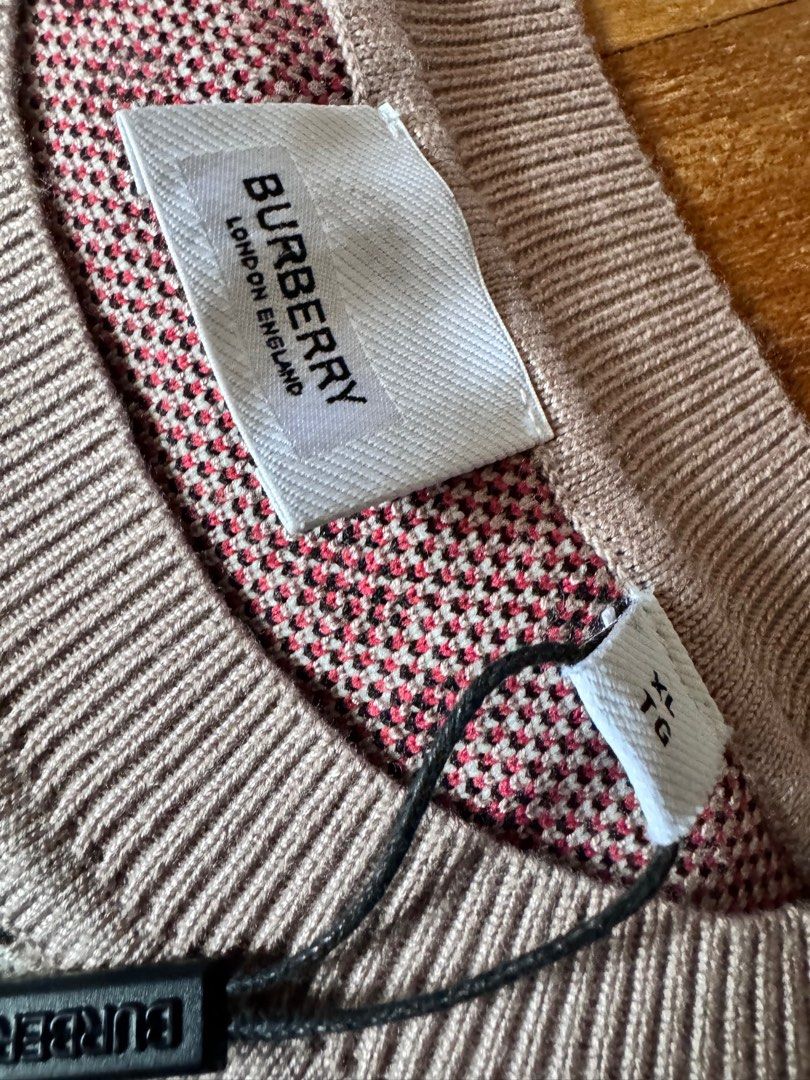 Brand New Burberry Sweater (Category: Coats, Jackets and Outerwear) located in Cebu City. Submitted by frime (Listing ID 1293032396, Image 2). Description: Brand New Burberry Sweater. Heavy and Thick Quality. Can provide the outlets paperbag. Fits too big for intended wearer. Dimensions (in inches) 21.5 (width)x 27 (length -top to bottom) No low ballers please. .