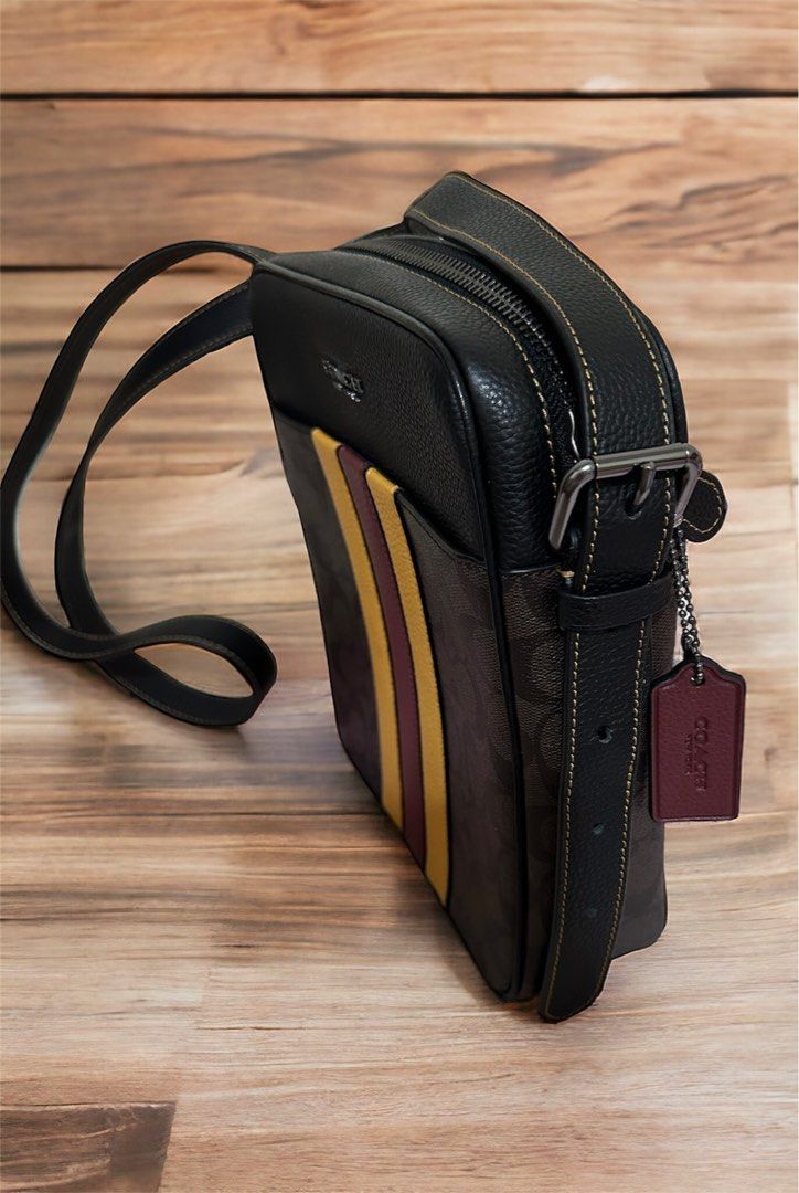 Coach hudson flight bag (Category: Luxury Bags & Wallets) located in Pasig City. Submitted by jackie_ginger (Listing ID 1293112104, Image 3). Description: Onhand with tag and care card 💯original from US.