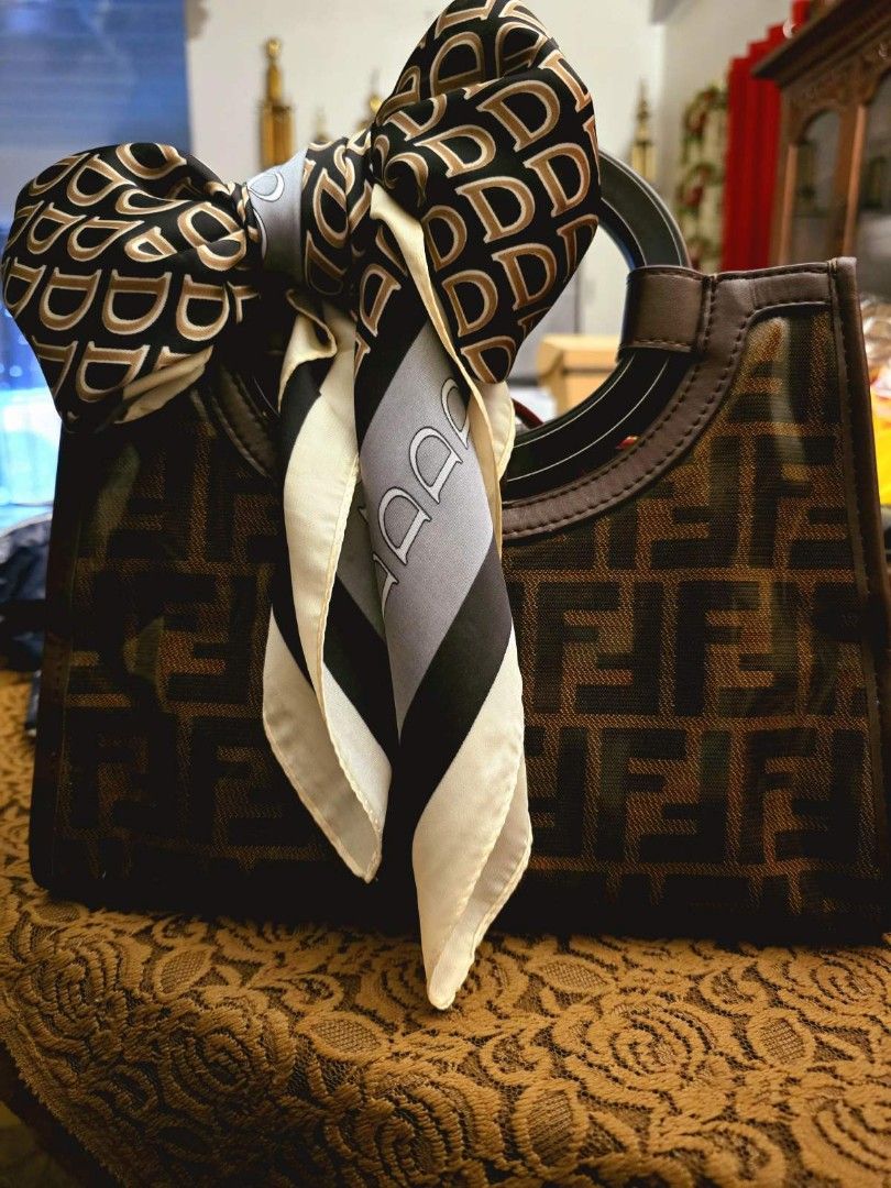 Fendi shoulder/ handbag (Category: Luxury Bags & Wallets) located in Quezon City. Submitted by 3mlab (Listing ID 1293001776, Image 2). Description: For Sale Fendi 2way. shoulder and handbag. with adjustable leather strap. gold hardware. can fit long wallet. with serial code issue: a few scratches on the handle. very nice in actual NOTE: Scarf not included.