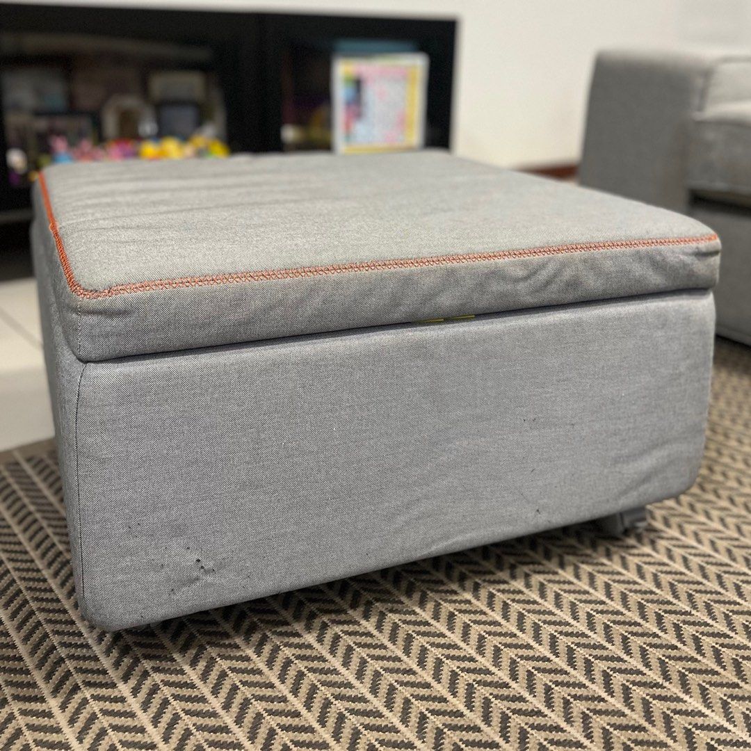 Glenmont storage outlet ottoman