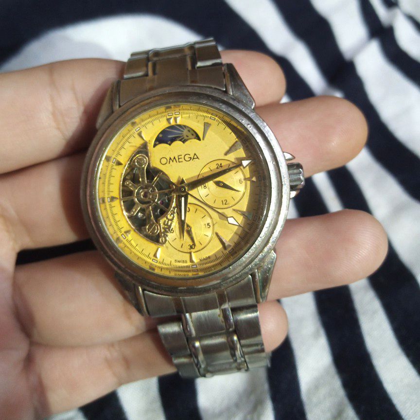 Jam tangan omega speedmaster professional automatic hotsell