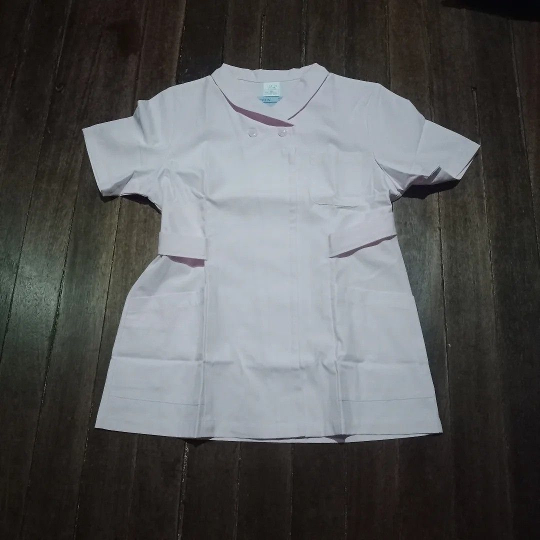 LADIES POLO UNIFORM (Category: Blouses) located in Makati City. Submitted by nyxhemera26 (Listing ID 1293147127, Image 3). Description: LADIES POLO UNIFORM • SIZE: S-M • LIGHT PINK COLOR.
