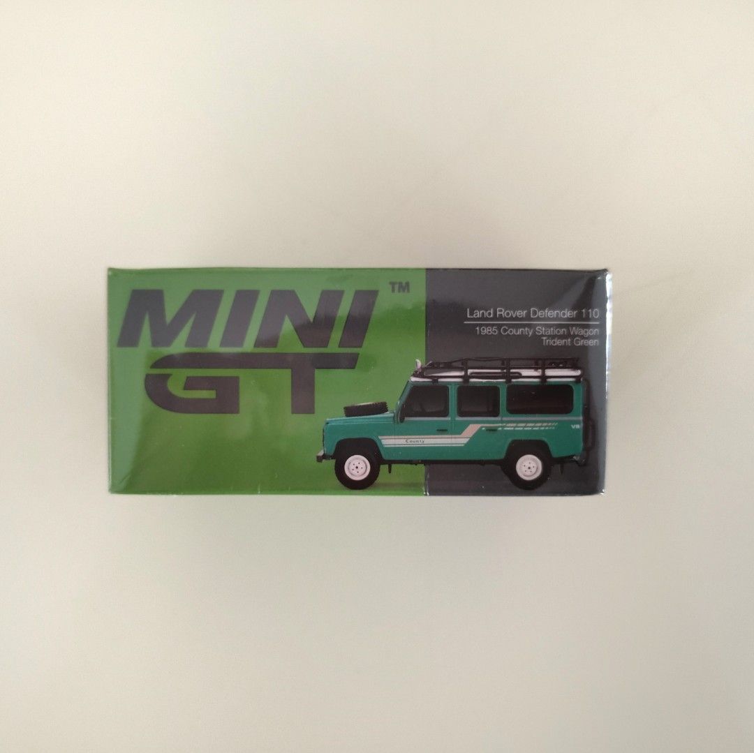 Mini GT 1/64 #590 Landrover Defender 110 1985 County Station Wagon -  Trident Green, Hobbies & Toys, Toys & Games on Carousell