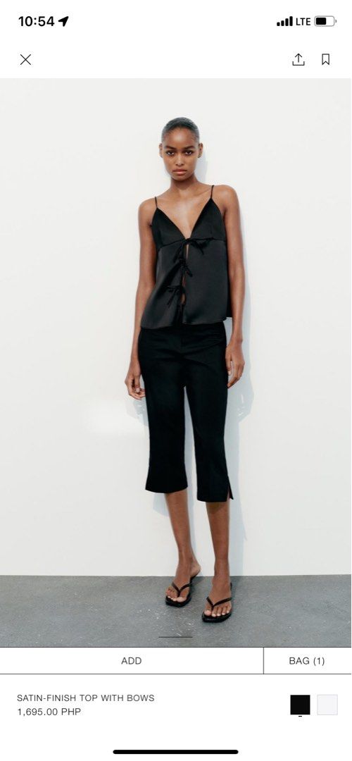 Satin Finish Top with Bows (Category: Sleeveless) located in Quezon City. Submitted by annec19 (Listing ID 1293003308, Image 1). Description: Still in stores and with tags. Rfs: wrong size.