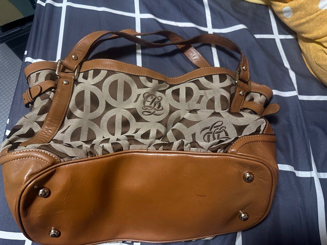 Authentic Louis Quatorze hobo bag med size (Category: Luxury Bags & Wallets) located in Tagum. Submitted by itscookiemonster (Listing ID 1293335818, Image 3). Description: Minimal flaws on handle Pm me for more details .