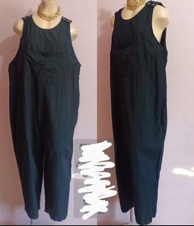 Black sleeveless with buttons overall jumpsuit romper jumper. Medium to XL. Unisex.