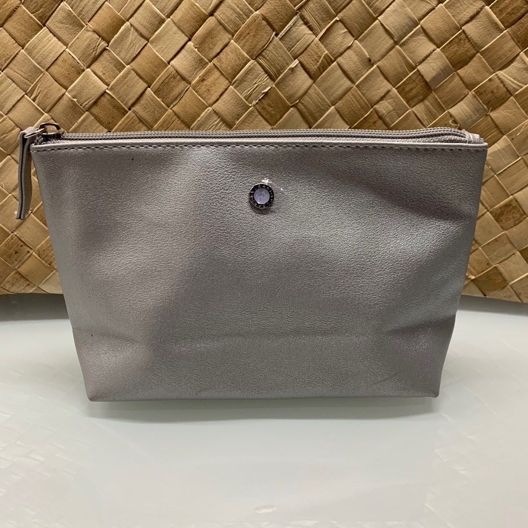 BVLGARI Gray Pouch (Category: Luxury Bags & Wallets) located in Manila. Submitted by thebookclubz (Listing ID 1293168193, Image 1). Description: Silver Has inside pockets Emirates .