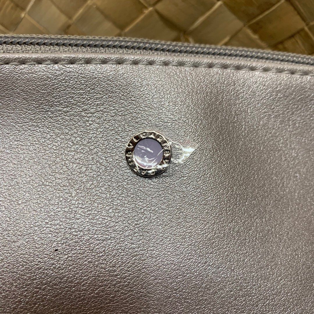 BVLGARI Gray Pouch (Category: Luxury Bags & Wallets) located in Manila. Submitted by thebookclubz (Listing ID 1293168193, Image 2). Description: Silver Has inside pockets Emirates .