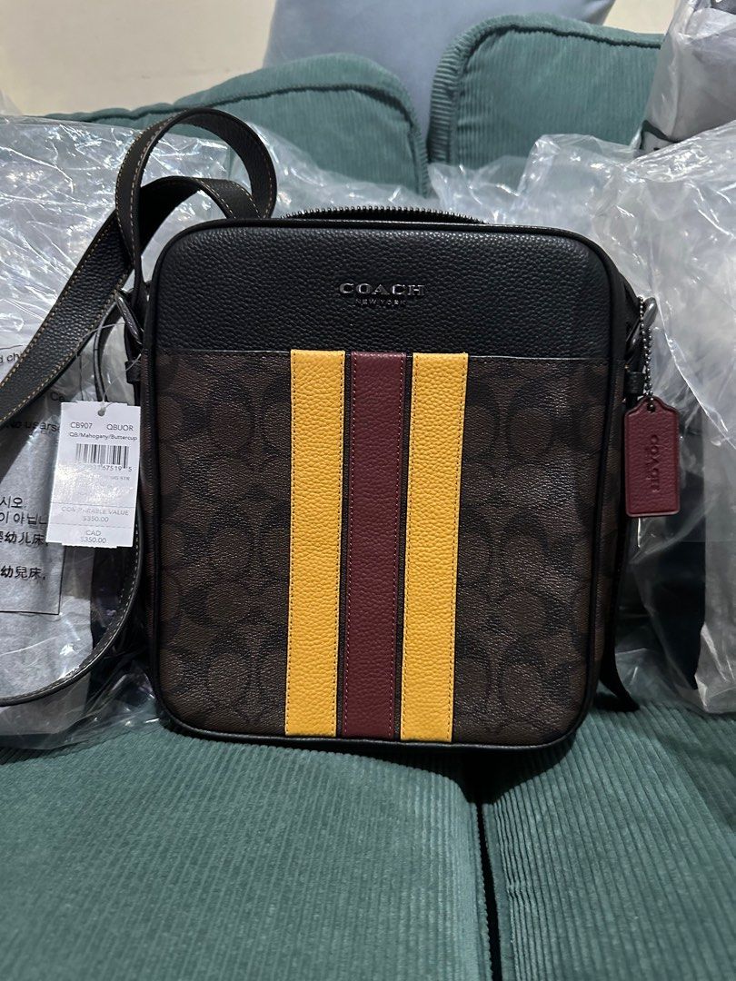 Coach hudson flight bag (Category: Luxury Bags & Wallets) located in Pasig City. Submitted by jackie_ginger (Listing ID 1293112104, Image 1). Description: Onhand with tag and care card 💯original from US.