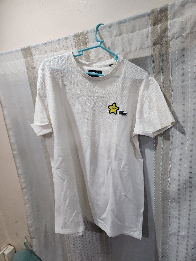 Lacoste White Tee (Category: Tshirts & Polo Shirts ) located in Lingayen. Submitted by brulee21 (Listing ID 1293304410, Image 1). Description: rfs: decluttering has minimal stain.