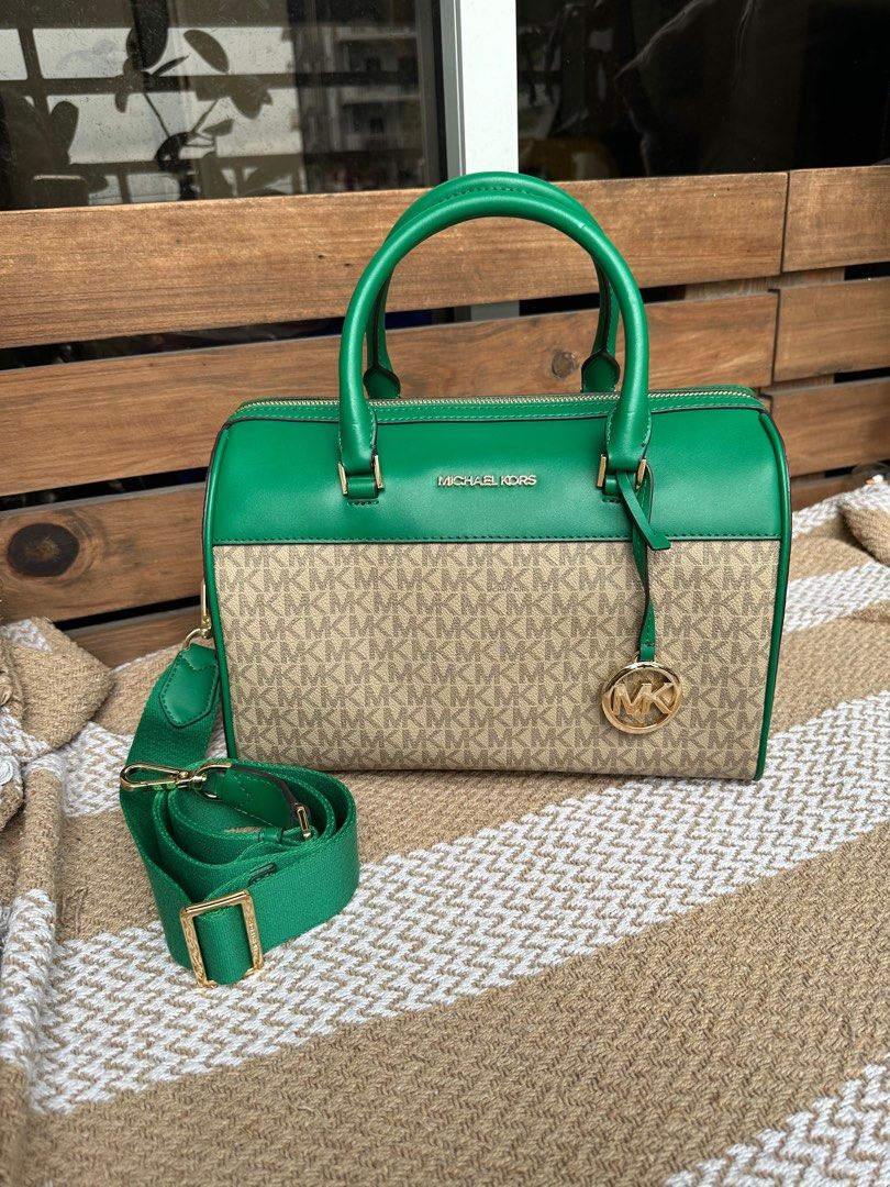 Mk duffle bag medium (Category: Luxury Bags & Wallets) located in Pasig City. Submitted by jackie_ginger (Listing ID 1276014943, Image 3). Description: Onhand with tag and care card.