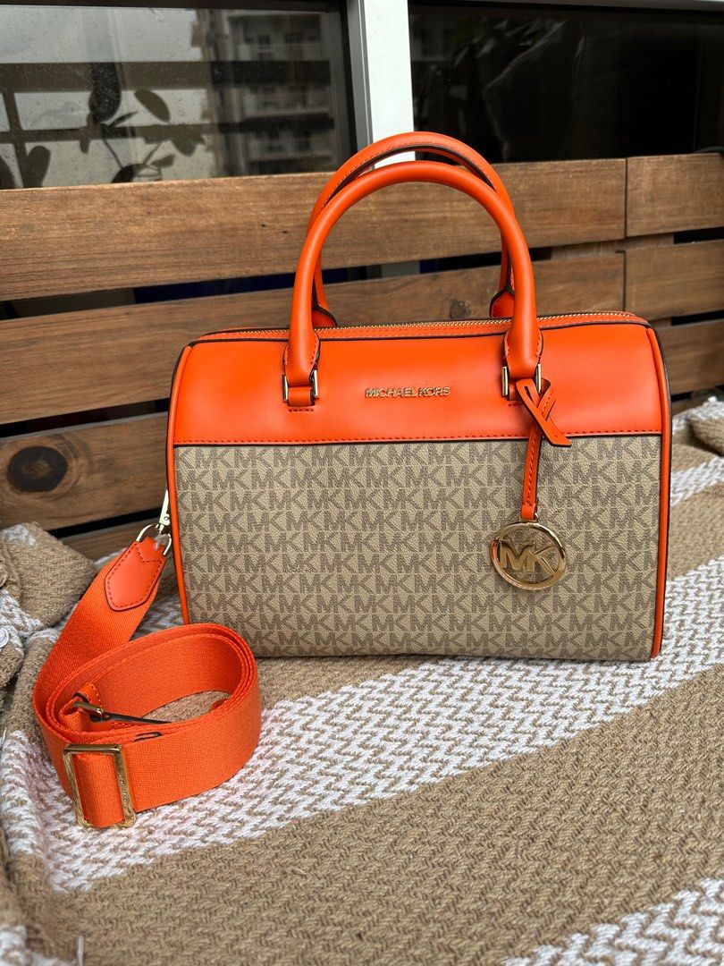 Mk duffle bag medium (Category: Luxury Bags & Wallets) located in Pasig City. Submitted by jackie_ginger (Listing ID 1276014943, Image 2). Description: Onhand with tag and care card.