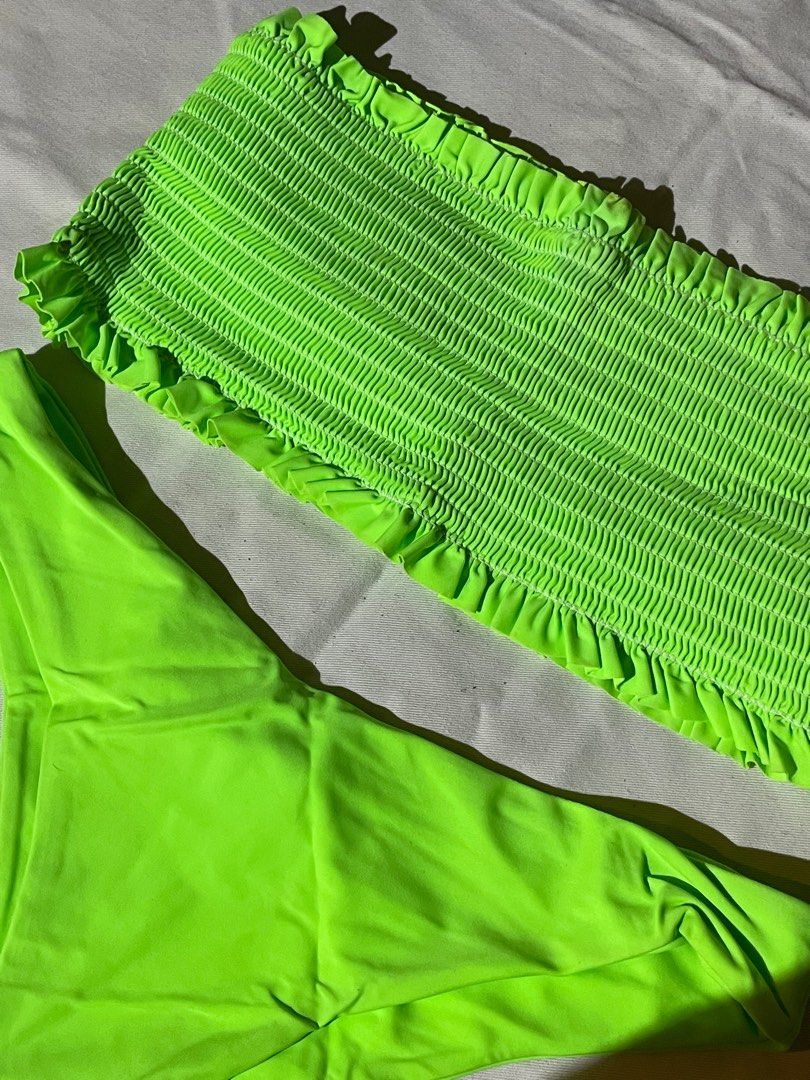 Neon green bandeau bikini (Category: Bikinis & Swimsuits) located in Mandaluyong City. Submitted by belleacd (Listing ID 1293323025, Image 2). Description: Small on tag Can fit up to semi medium Like new once used.