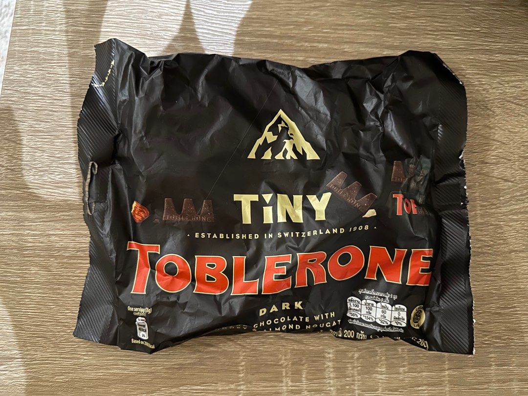 Toblerone tiny Dark Chocolate (Category: Other Food & Drinks) located in Manila. Submitted by vane1221 (Listing ID 1293156406, Image 1). Description: 200g Location: BGC.