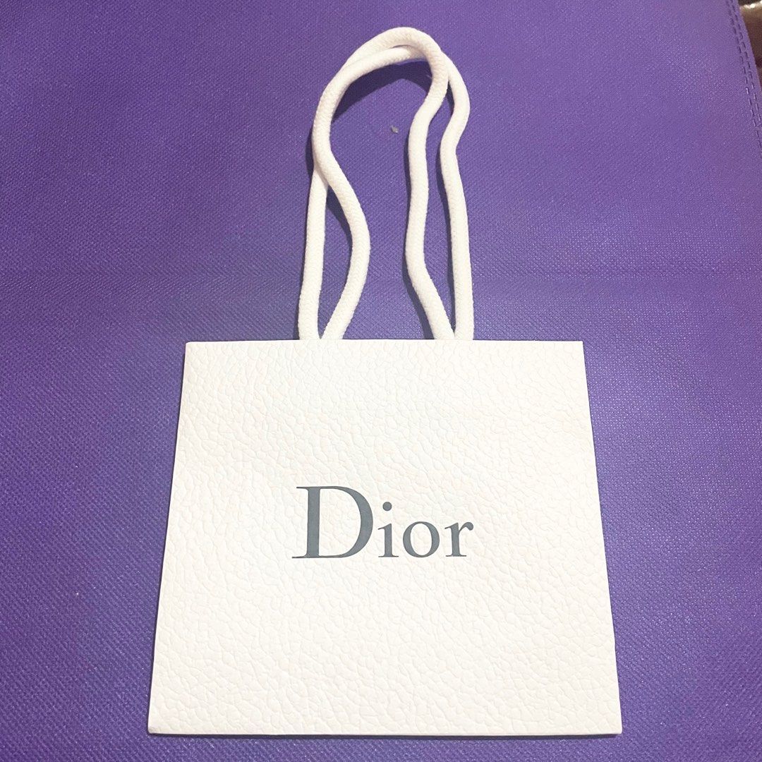 AUTHENTIC Dior white paperbag paper bag gift bag (Category: Makeup) located in Pasig City. Submitted by deluxuryshop (Listing ID 1293355705, Image 1). Description: Pm for more details plain white paperbag Size is 5.8 inches by 5 inches Brand new and authentic Selling low and affordable One of the best selling brands in the world makeup skincare perfume world .