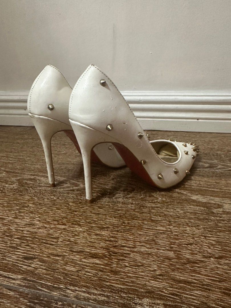 Louboutin white studded heels top