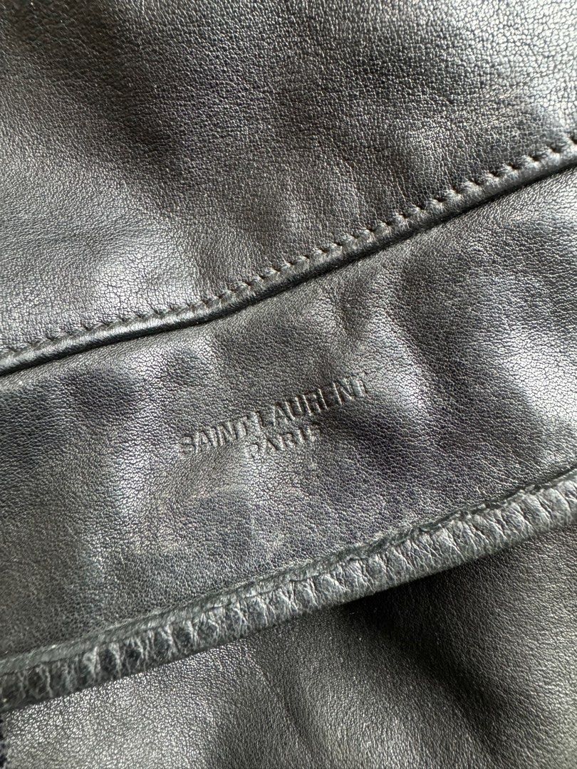 FW15 Saint laurent By Hedi slimane Leather backpack (Category: Luxury Bags & Wallets) located in Bayambang. Submitted by highendsph (Listing ID 1293481722, Image 3). Description: [] FW15 Saint laurent By Hedi slimane Leather backpack Width: 10 Lenght: 16 Depth: 8 Materials: leather Condition: 9/10 Issue: None No refund/ no return, ask before buy, all sales are final..