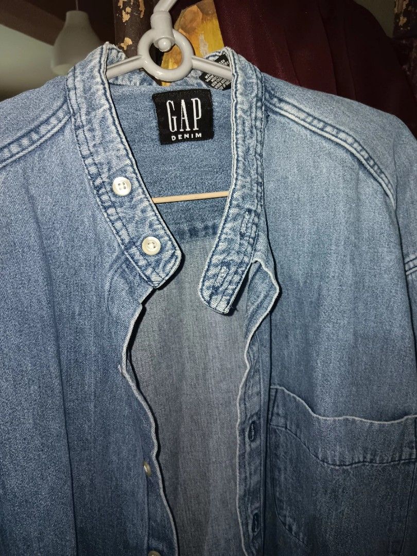 Gap Denim Long sleeves polo (Category: Tshirts & Polo Shirts ) located in Caloocan City. Submitted by declutterstn (Listing ID 1293416708, Image 3). Description: no flaws.light colored denim. Chinese collar. authentic Gap. malaki cya Para s small size .may fit medium to large frames men..