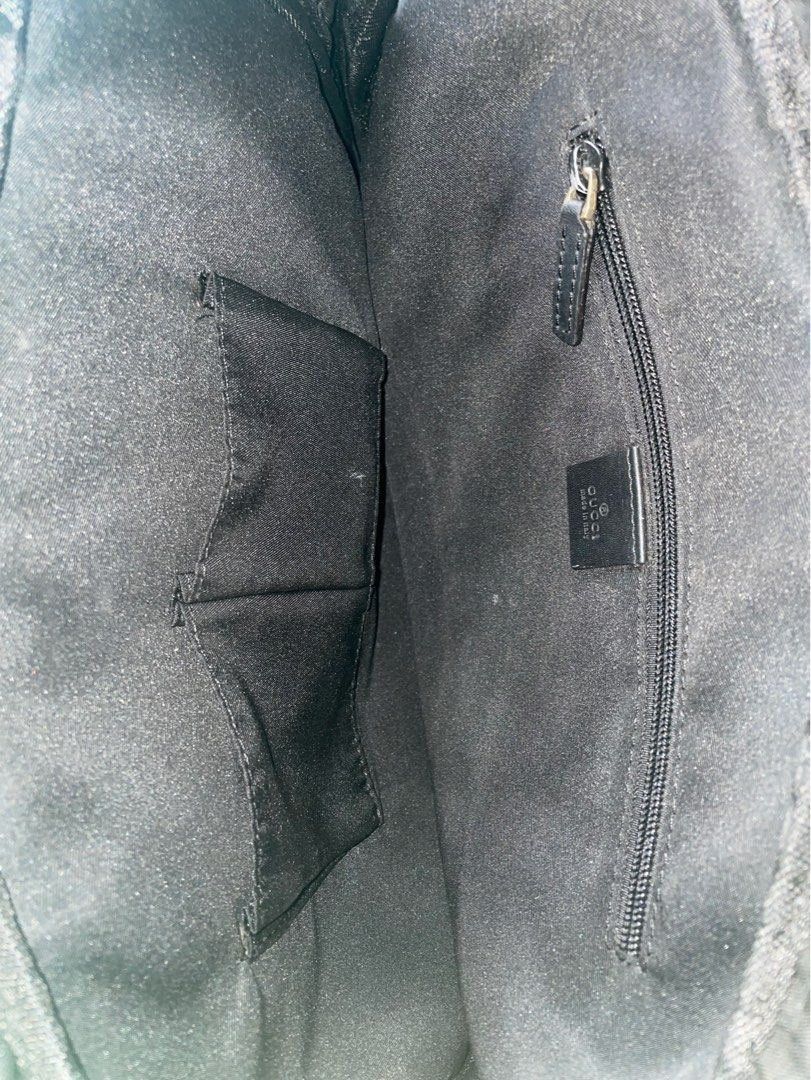 Gucci Laptop Bag (free shipping) (Category: Luxury Bags & Wallets) located in Calamba. Submitted by juan_jawnz (Listing ID 1293454419, Image 3). Description: What you see is what you get! It can fit documents and laptop! Dimensions: Width - 14 inches Length- 12 inches Issues: - It does not have the sling (based off photos from the internet) - very minor scratches on the bottom of the bag and handle Negotiable! Off/legit.