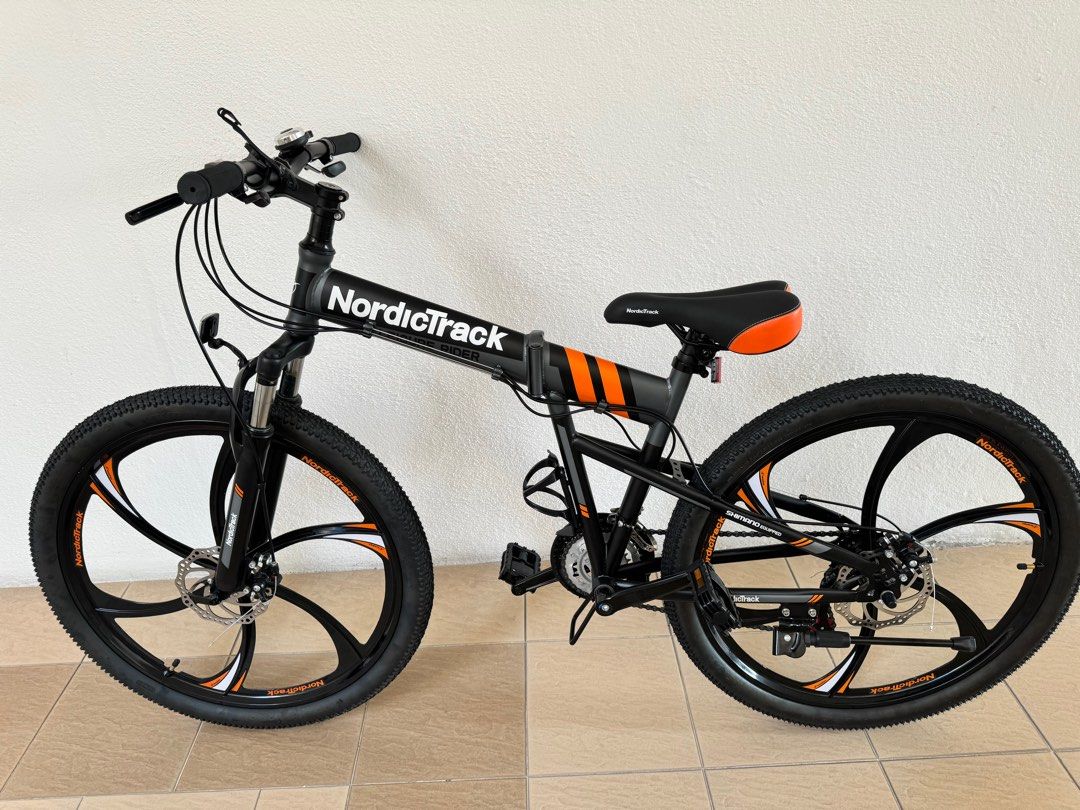 Nordictrack folding bike 26 blue top